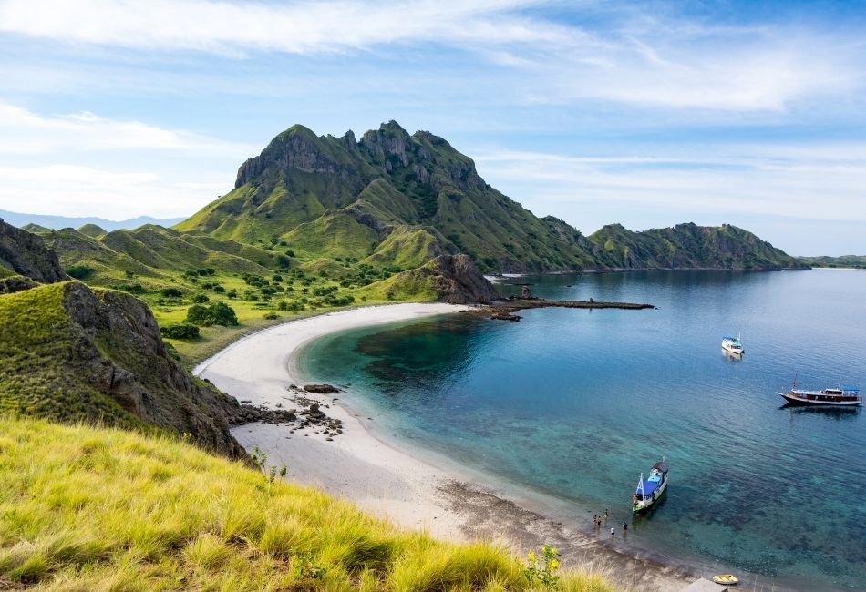 Hike Padar Island before sunrise for panoramic bay views