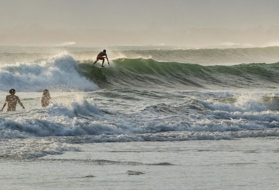 Surfing on Bingin Beach in Bali
